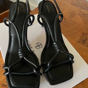 Anine Bing leather sling back sandals.